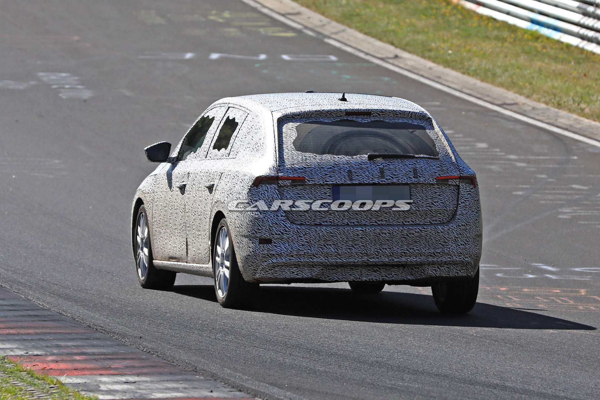 2019-Skoda-Rapid-Spaceback-spy-shots-7 2019 Skoda Rapid Spaceback Makes Spy Debut At The Nürburgring