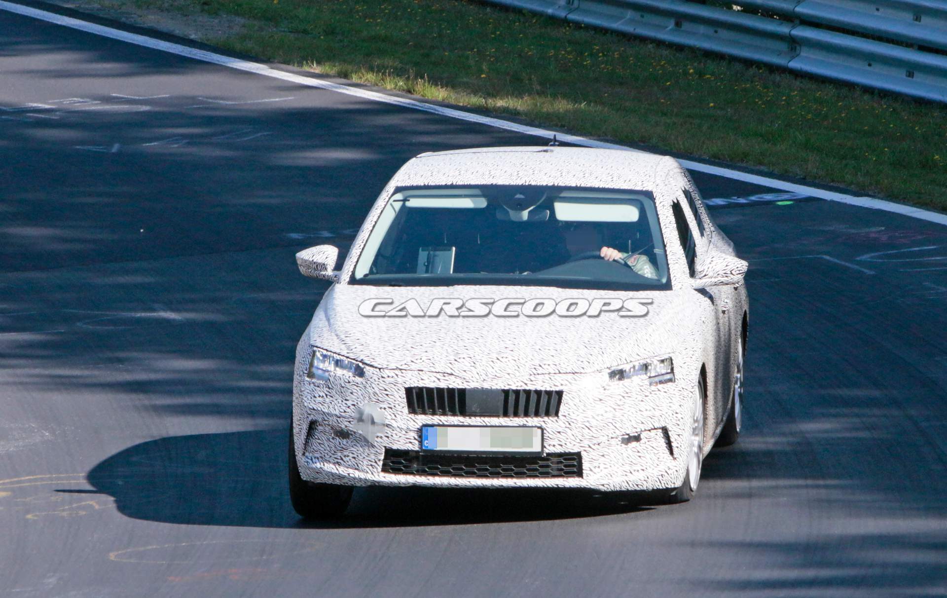2019-Skoda-Rapid-Spaceback-spy-shots-38 2019 Skoda Rapid Spaceback Makes Spy Debut At The Nürburgring