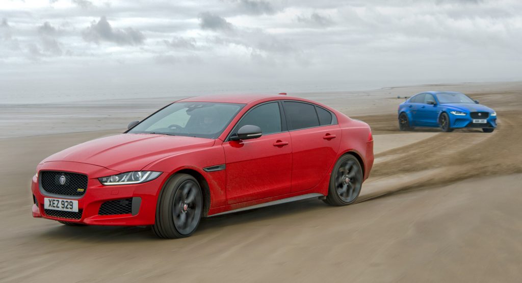  Watch Two Similar Yet Very Different Jaguar XEs Race Down The Beach