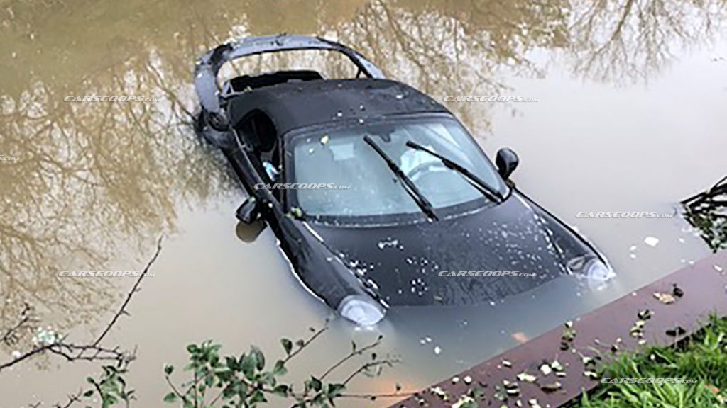 Porsche 911 Loses It On Wet Road, Ends Up Taking A Bath In A Creek