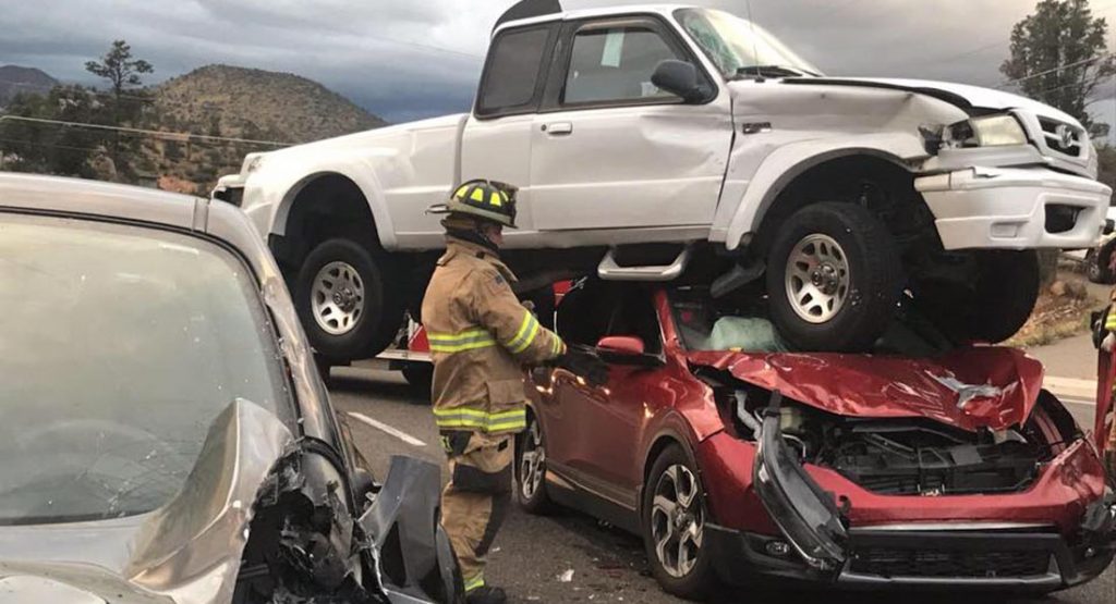 Mazda Pickup Somehow Balances On Honda After Crash