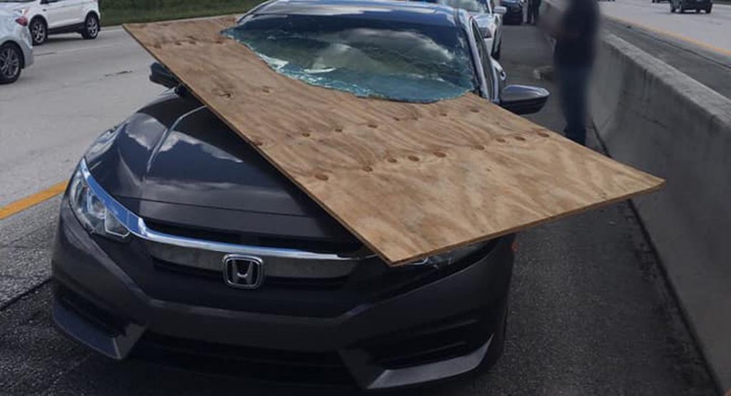  Honda Driver Almost Decapitated After Unsecured Wood Flies Off Pickup