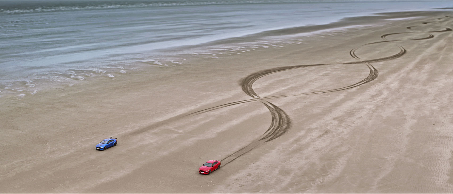 Jag_XE_300_SPORT_SV_Project_8_DNA_181018_01 copy Watch Two Similar Yet Very Different Jaguar XEs Race Down The Beach