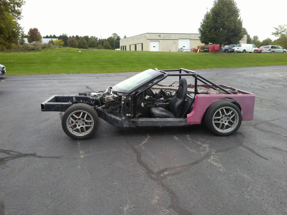 jeep-corvette-02 Somebody Tried Turning This Corvette Into A Jeep Roadster