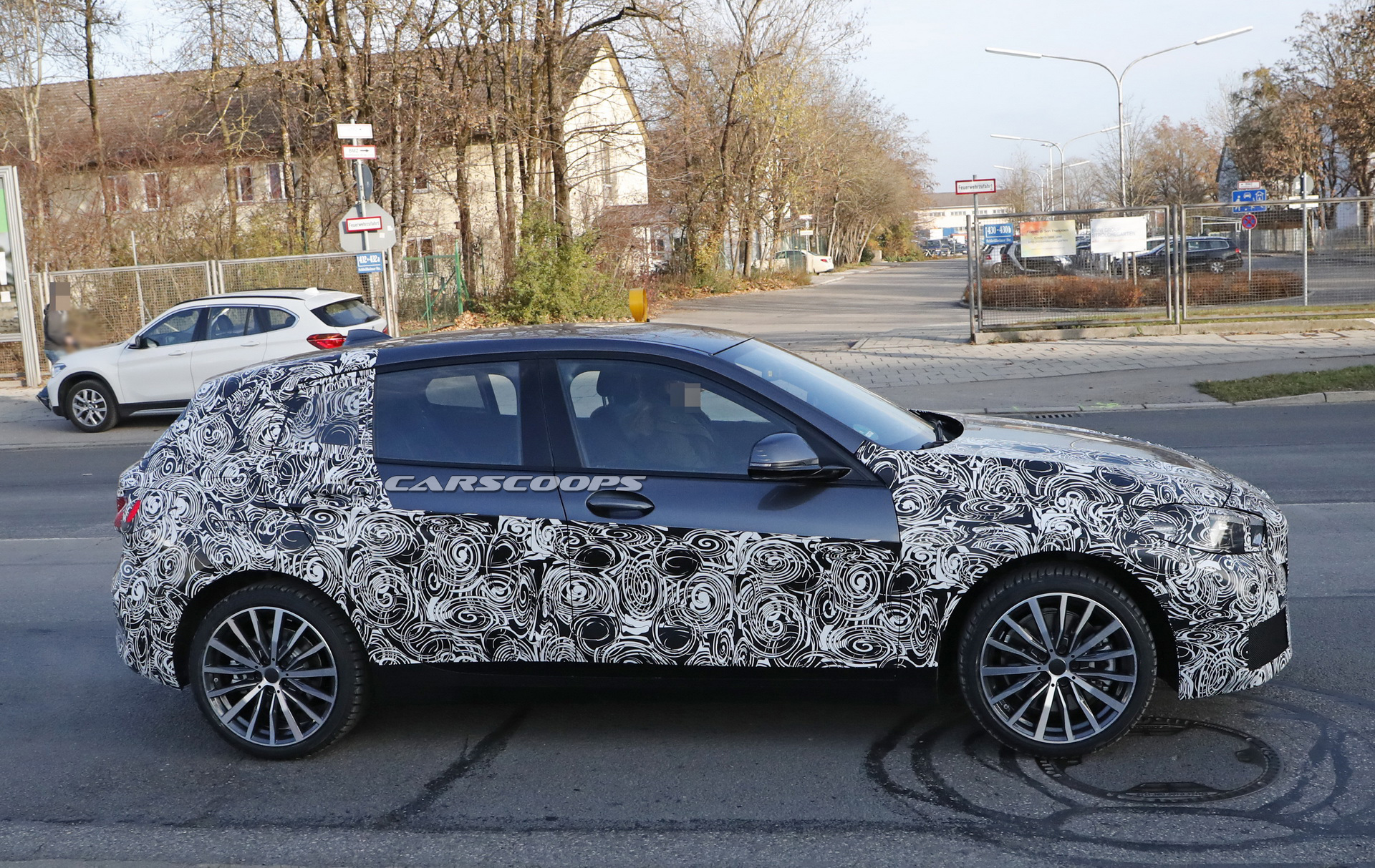 2019 bmw 1series prototype less camo 6 2019 BMW 1-Series: New Front-Wheel Drive Hatch Shows More Flesh