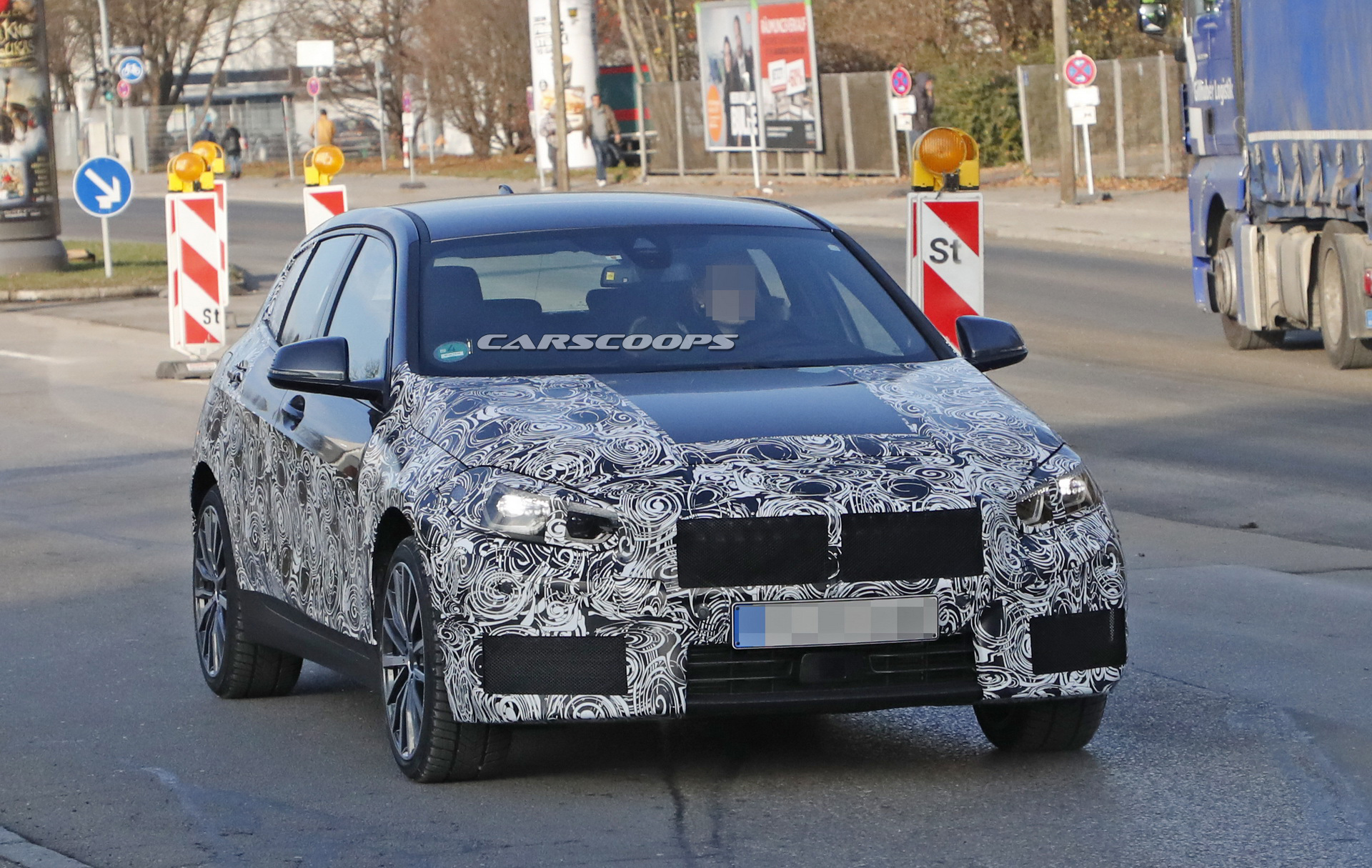 2019 bmw 1series prototype less camo 1 2019 BMW 1-Series: New Front-Wheel Drive Hatch Shows More Flesh