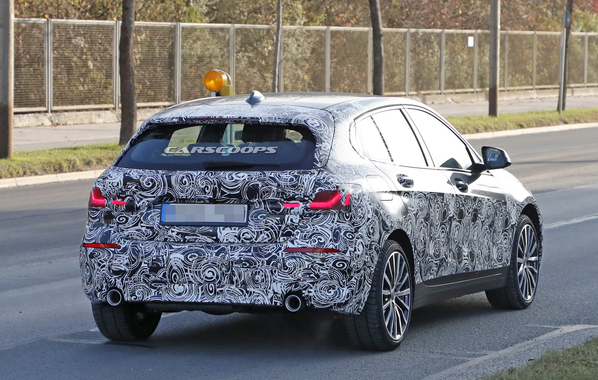 2019 bmw 1series prototype less camo 11 2019 BMW 1-Series: New Front-Wheel Drive Hatch Shows More Flesh