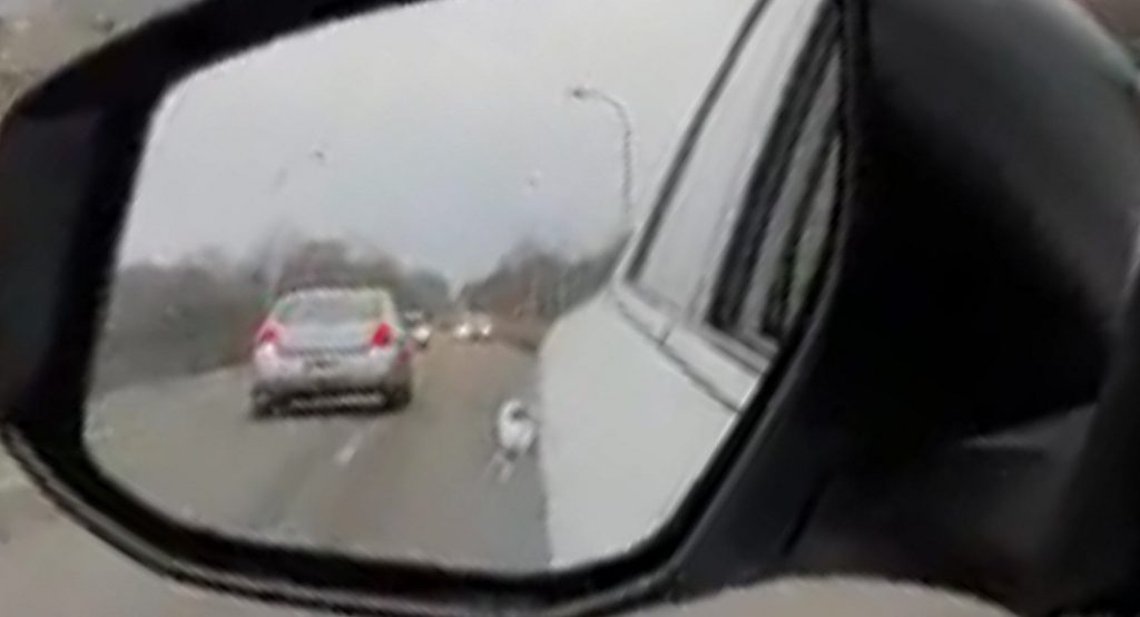 Nothing To See Here, Just A Car Driving In Reverse On A Freeway