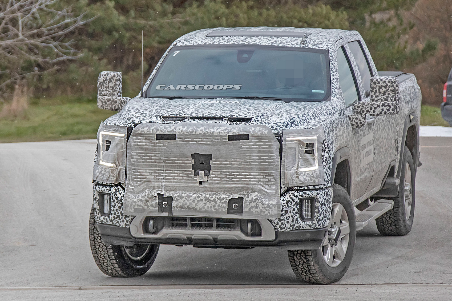 2020 gmc sierra hd spy shots 3 2020 GMC Sierra Denali HD Shows Its Face In First Teaser Image