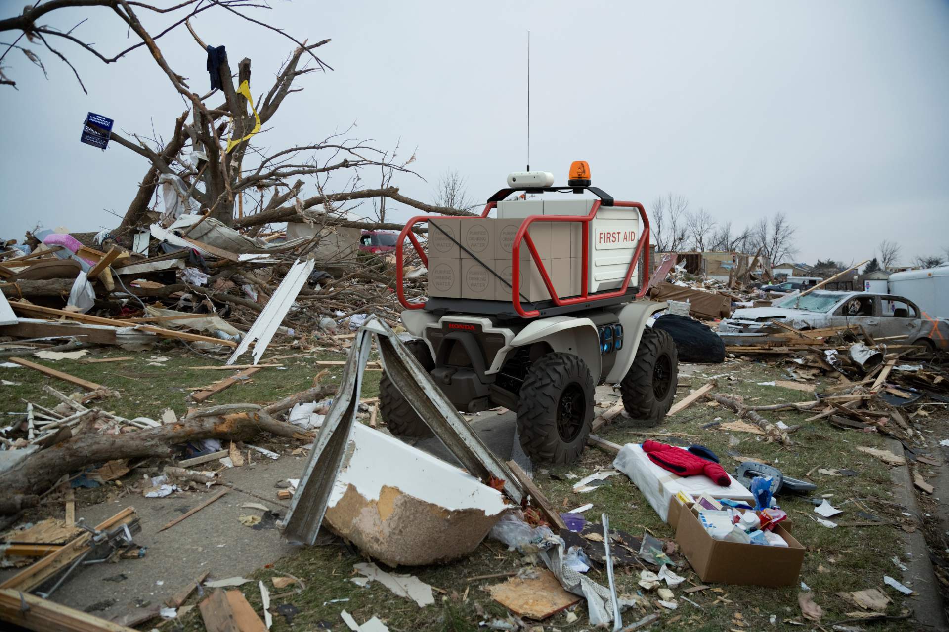 USA, Illinois, Washington, Rubble of town destroyed by tornado Honda’s Autonomous Work Vehicle Is Helping Humans, Not Replacing Them