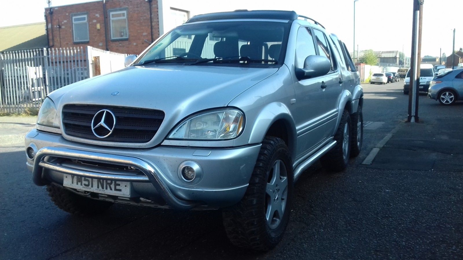 mercedes-benz ml 6x6 1 First-Gen Mercedes ML 6×6 Pickup Conversion Will Make You Check Your Eyesight