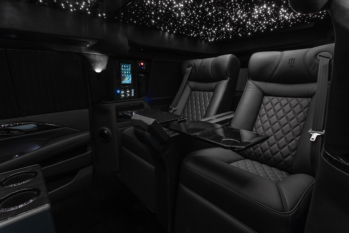 Lexani-Cadillac-Airline-Tables Lexani’s 2019 Cadillac Escalade Viceroy Is A 23-Foot Long Bulletproof BrontoSUVrus