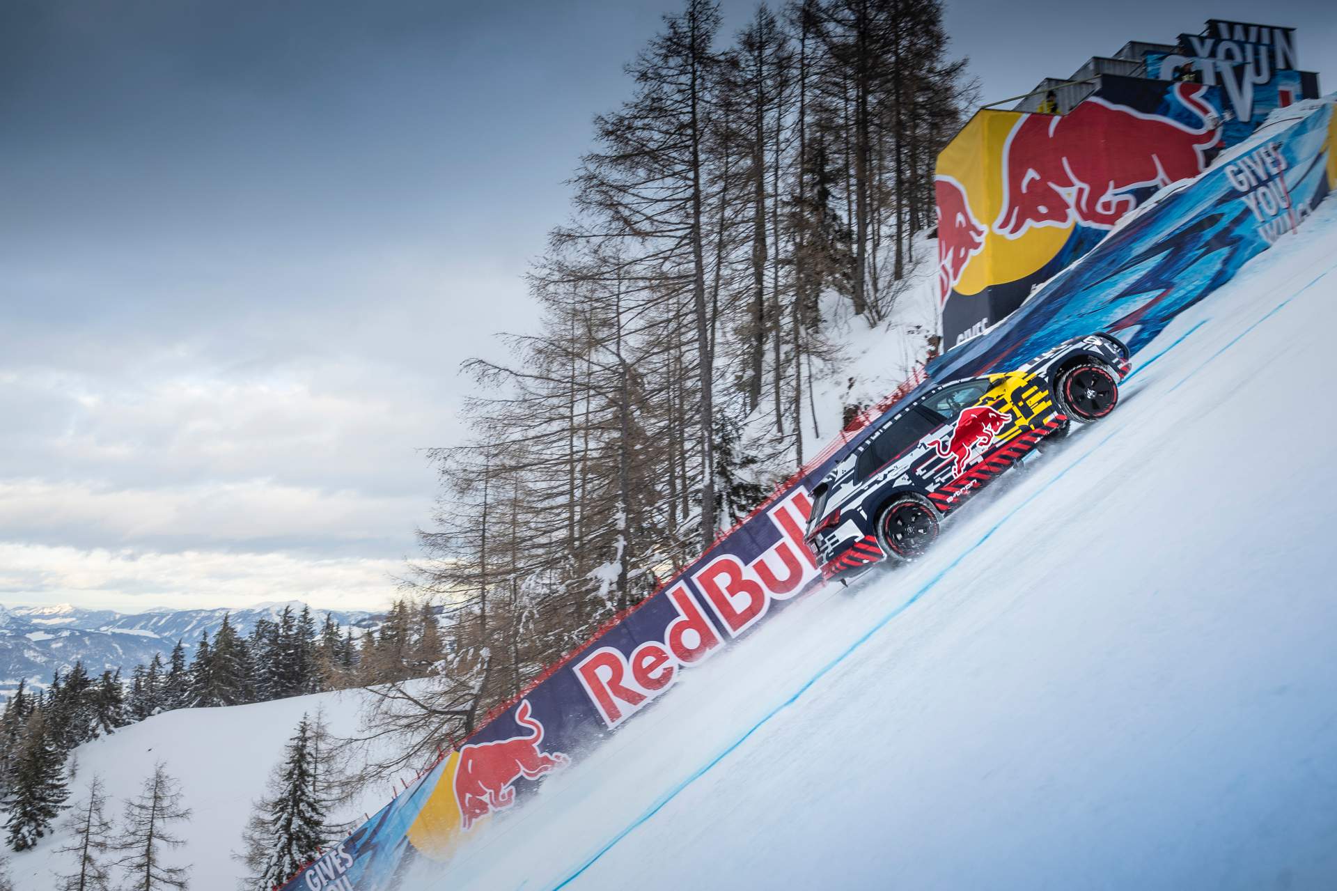 Mattias Ekstroem Audi E-Tron Conquers Steep Ski Slope Thanks To Additional Motor, Studded Tires