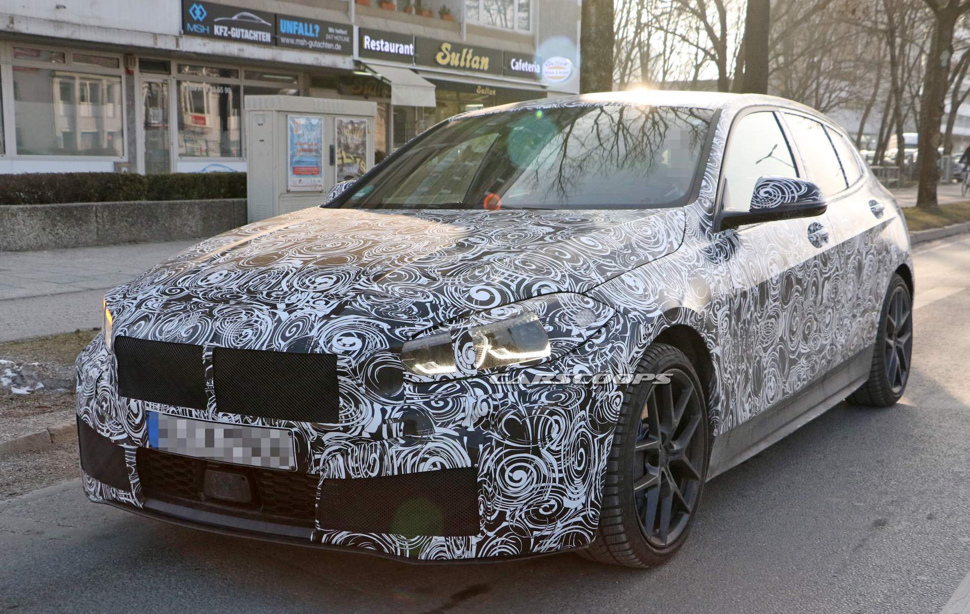 2019 BMW 1-Series hatchback spy shots 5 2019 BMW 1 Series Shows 3 Series-Inspired Dash And Funky LED Door Trims