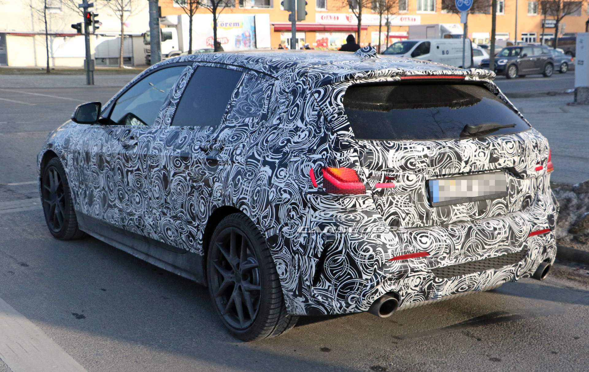 2019 BMW 1-Series hatchback spy shots 11 2019 BMW 1 Series Shows 3 Series-Inspired Dash And Funky LED Door Trims
