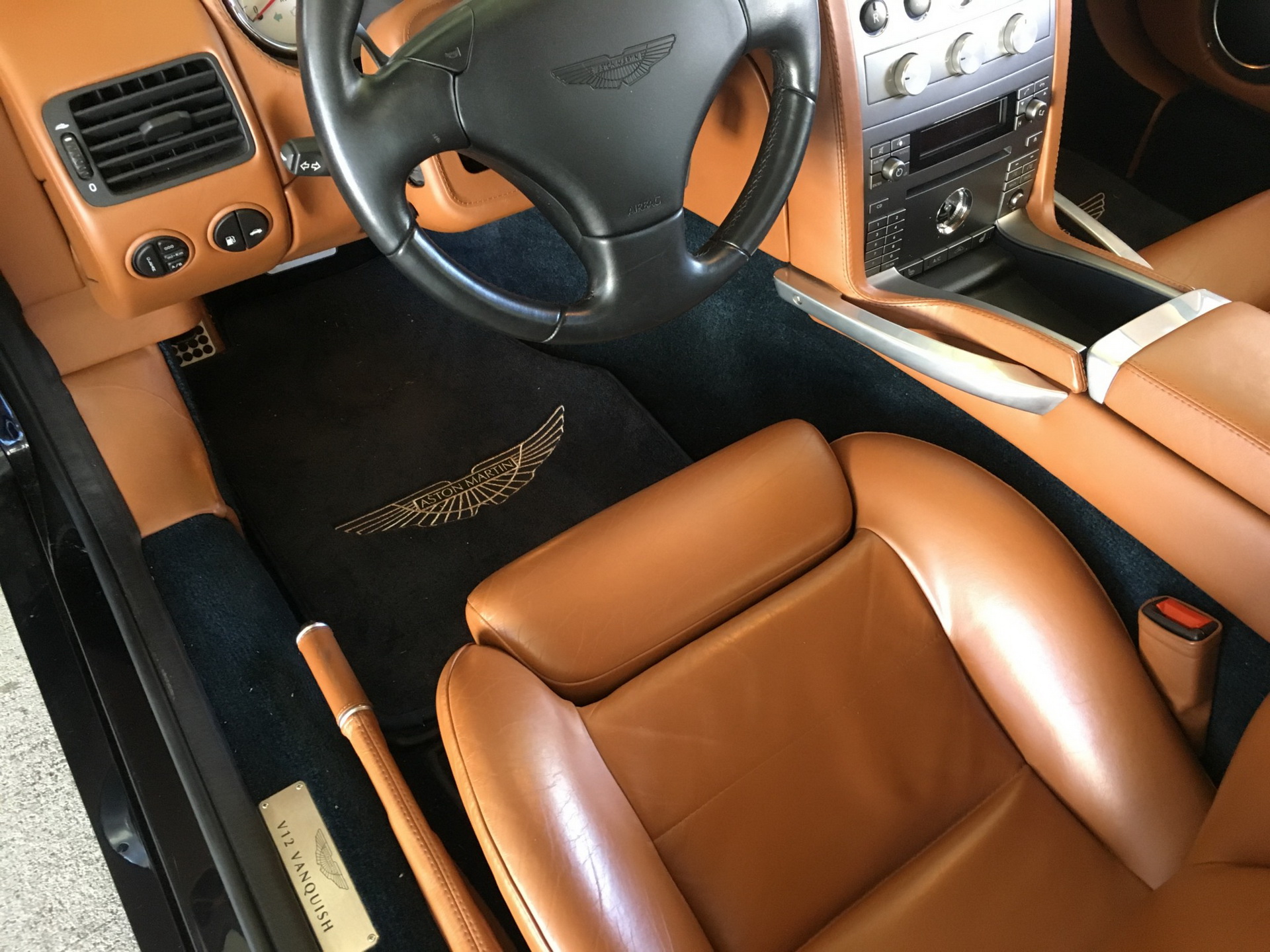 2006 aston martin vanquish s bat auction 47 2006 Aston Martin Vanquish S Rocks BMW Carbon Black Paint