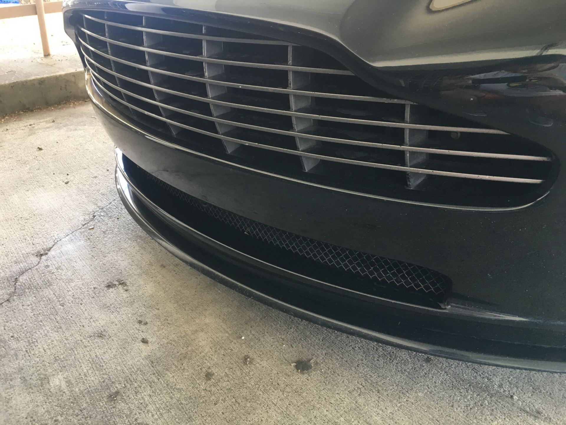 2006 aston martin vanquish s bat auction 42 2006 Aston Martin Vanquish S Rocks BMW Carbon Black Paint