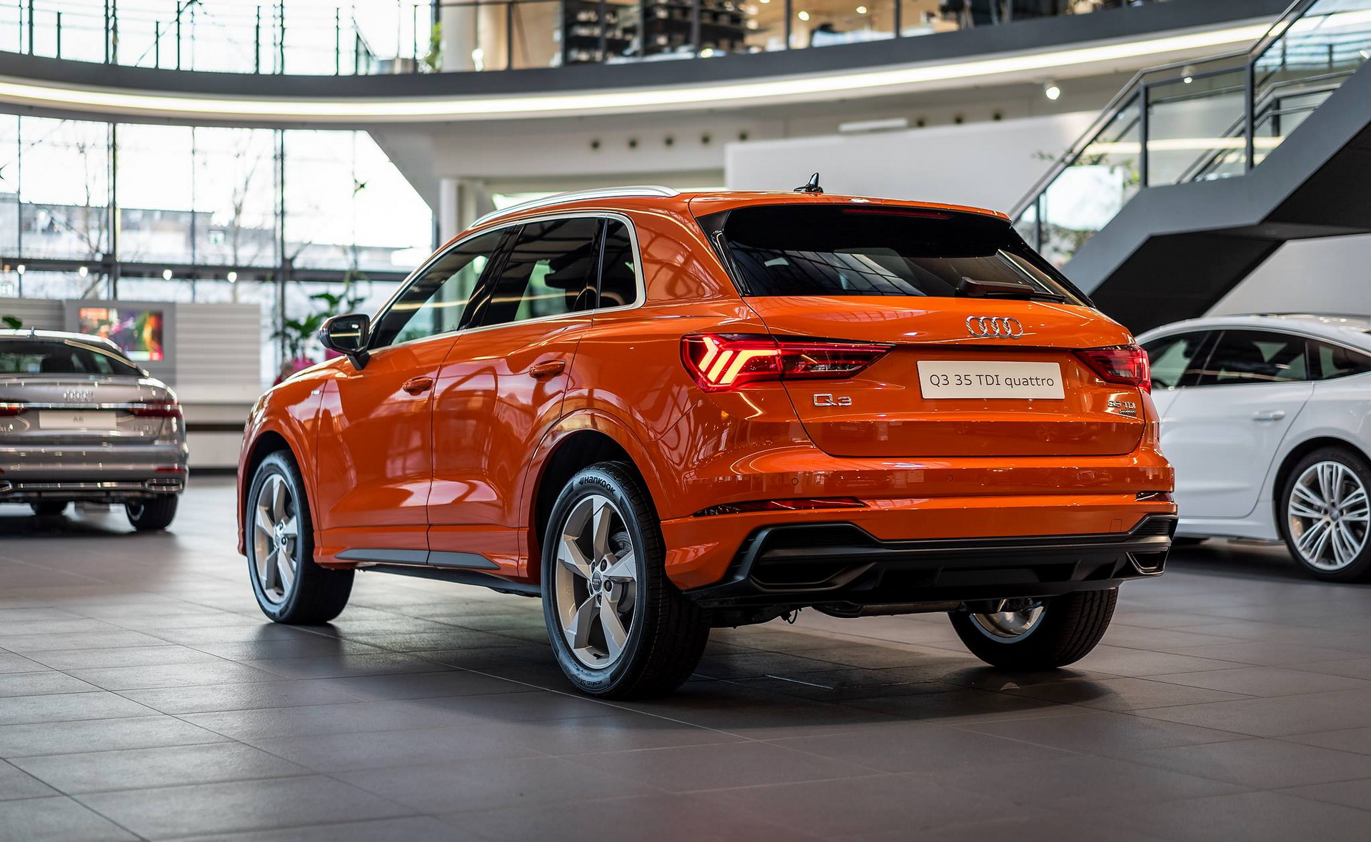 audi q3 pulse orange forum neckarsulm 2 Pulse Orange Audi Q3 Sports A Colorful Alcantara Interior