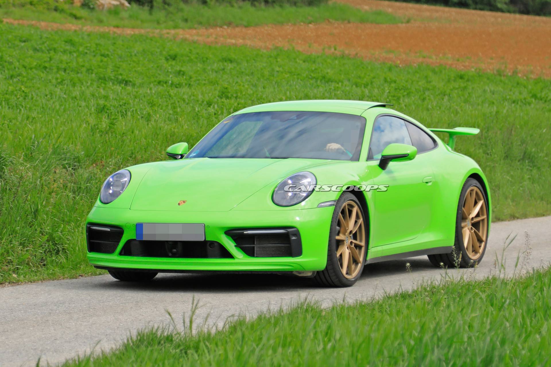 Porsche 911 992 new variant spy shots 5 Mystery Porsche 992 Prototype With Fixed Rear Wing Spied