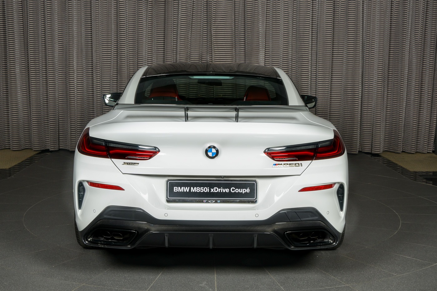 White BMW M850i Coupe Lives On A Wing And… Nothing Else, Really