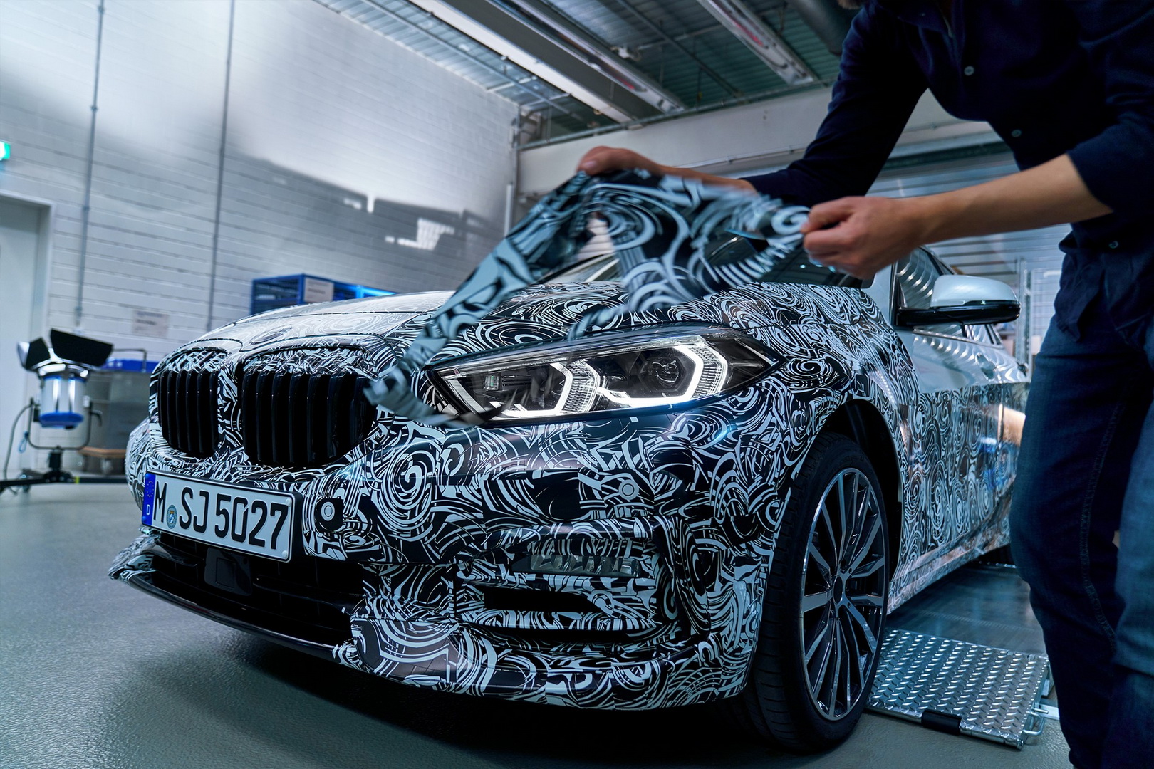 2020 bmw 1-series teasers 3 2020 BMW 1-Series Drops Camo In Official Teasers, Reveals Digital Gauges