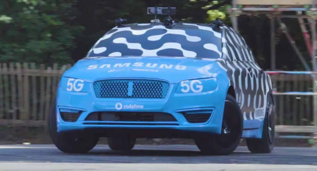 Vaughn Gittin Jr Powerslides A Lincoln MKZ Remotely Using VR!