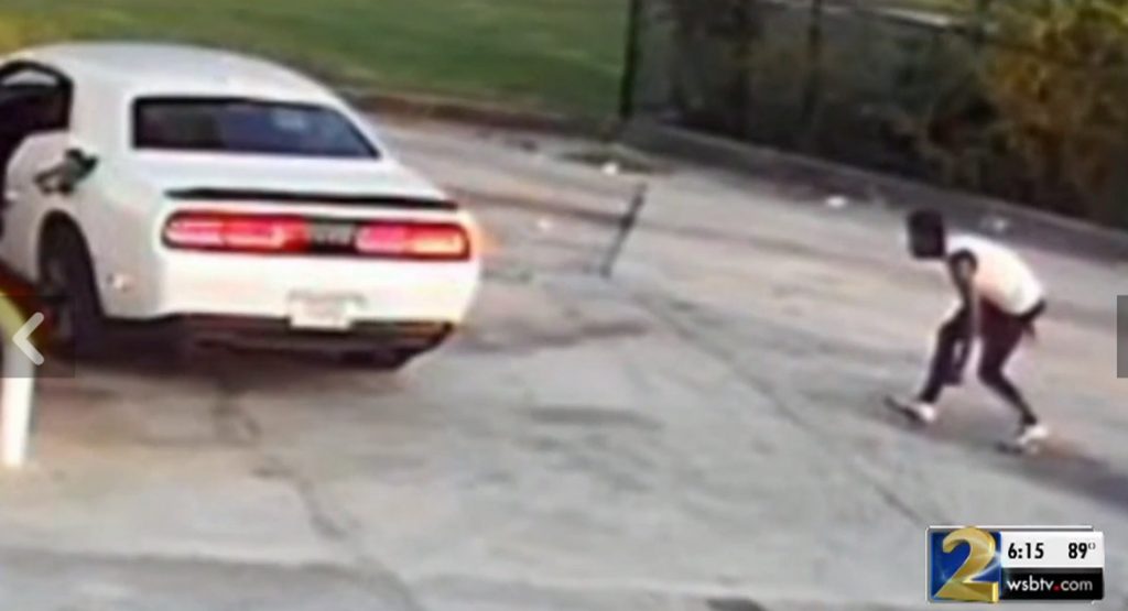 Woman Douses Man Trying To Steal Her Dodge Challenger With Gasοline