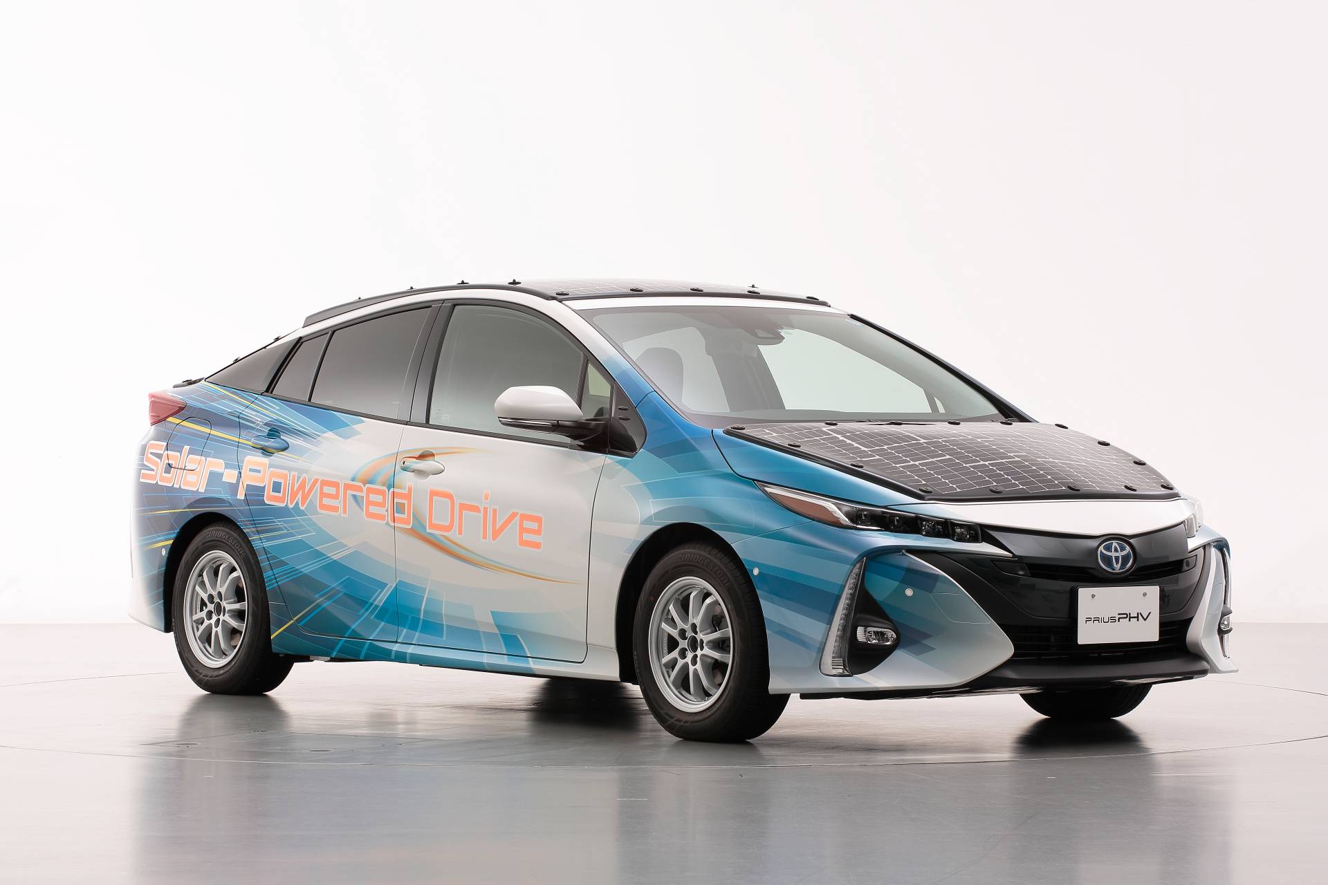 Toyota Covers Prius Prime With Solar Panels That Also Charge Battery On The Move