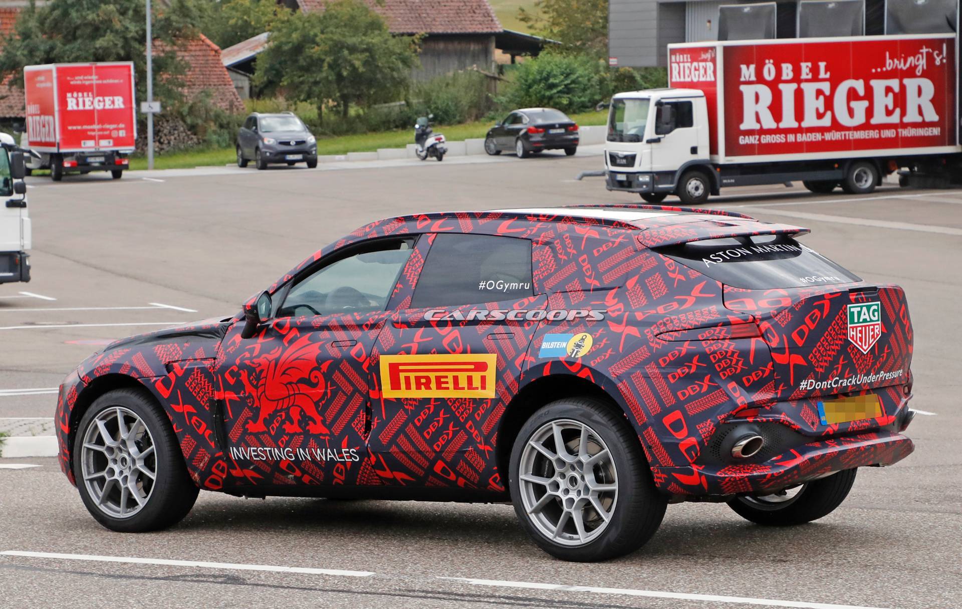 Aston Martin DBX Reveals Dramatic Rear End With Vantage-Inspired Taillights