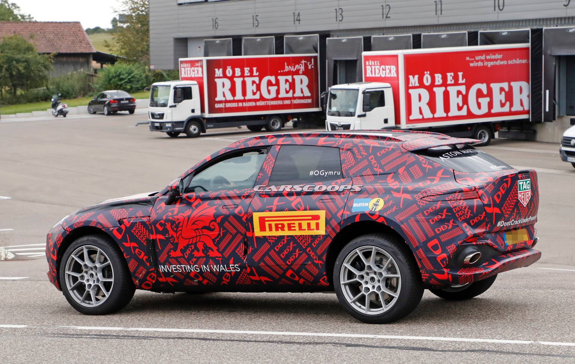 Aston Martin DBX Reveals Dramatic Rear End With Vantage-Inspired Taillights