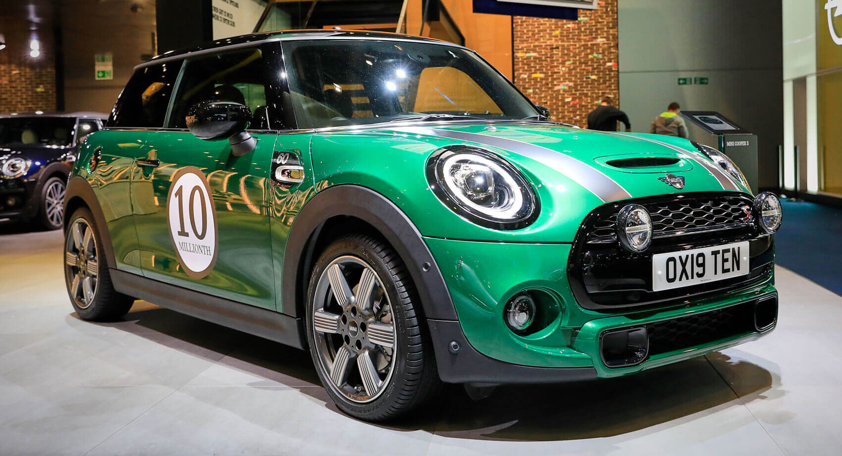 Presented in British Racing Green with Black Bonnet Stripes, this 2021, Mini Coopers