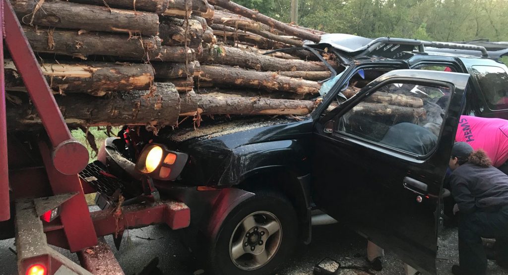  Nissan Xterra Owner Almost Reaches Their Final Destination After Rear-Ending A Logging Truck