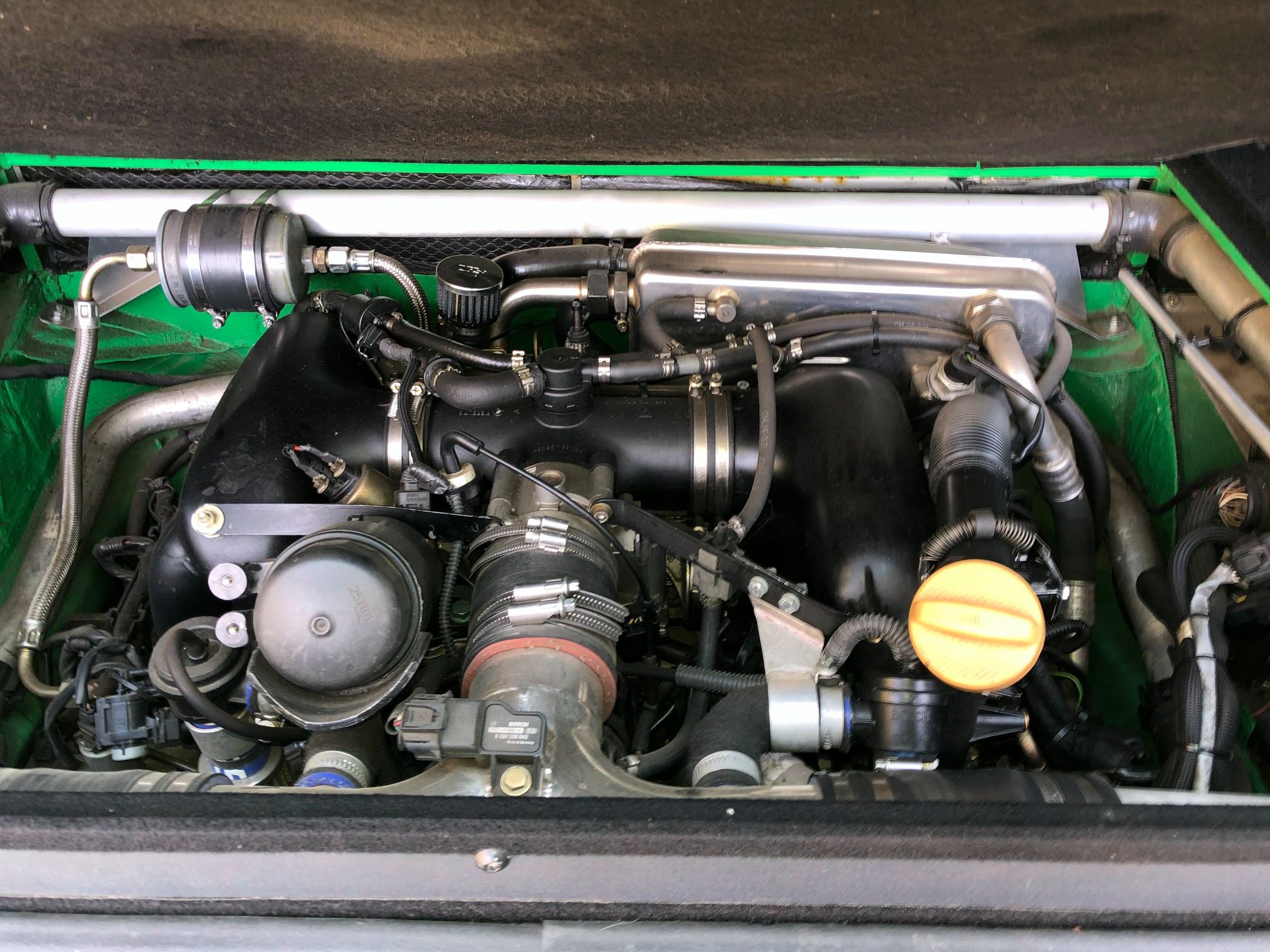 This Porsche 911 Turbo-Powered VW T5 Bus Has A Central Driving Position