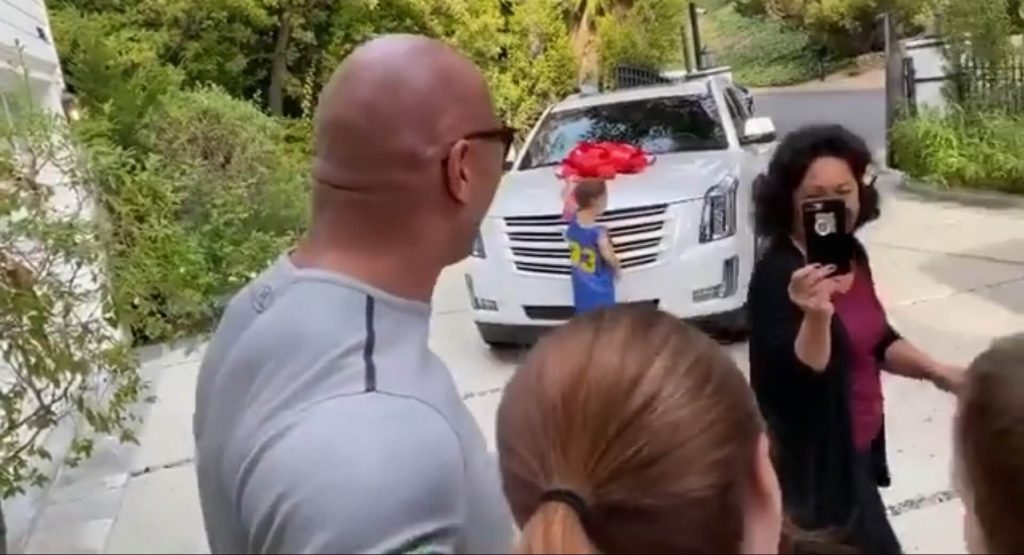  Dwayne ‘Santa Claus’ Johnson Gifts New Cadillac Escalade To Sister-In-Law