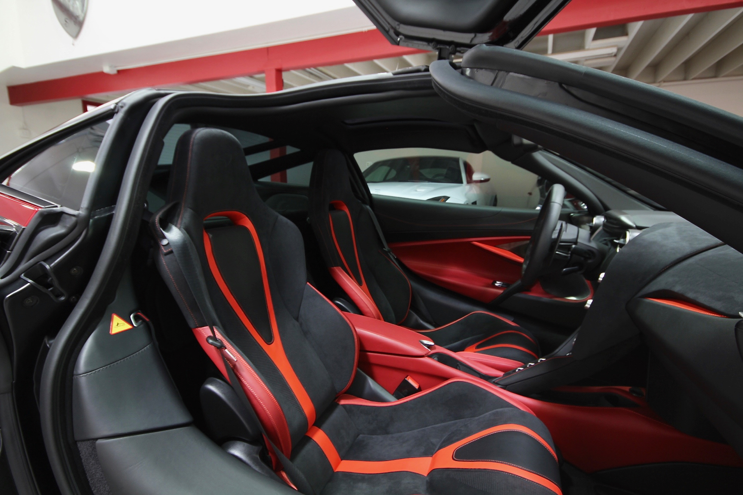 Pick Up This Gorgeous Red 2018 McLaren 720S And Scare Off Hypercars