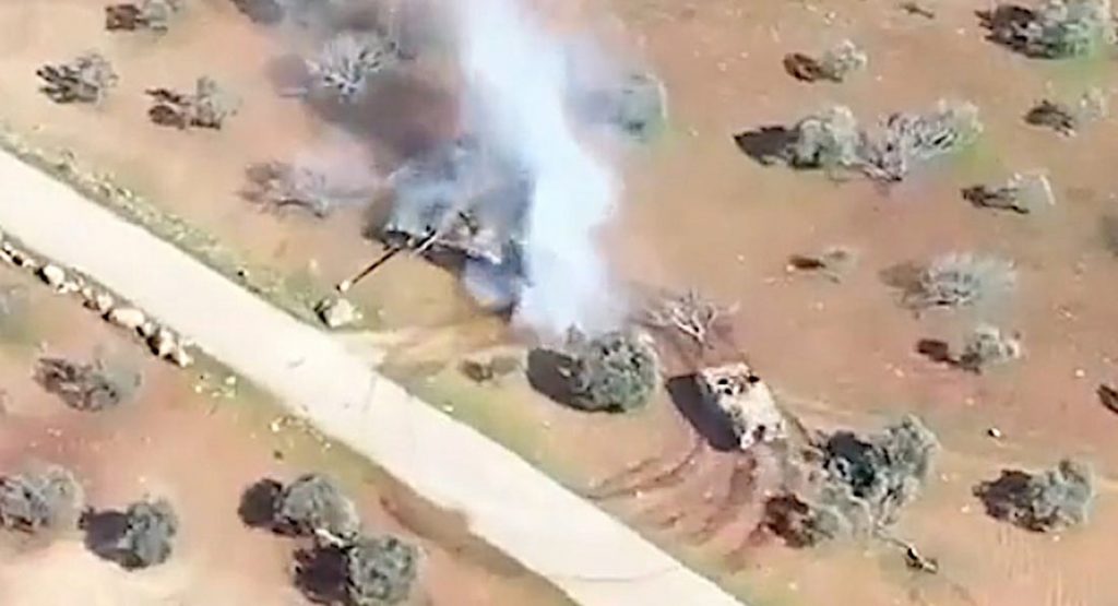 Drone Cams From Syria Shows Personnel Carrier Butting Heads With A T-72 Tank