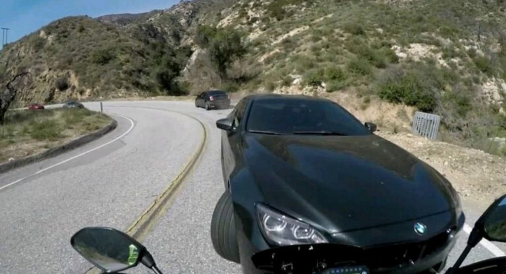 BMW M6 Driver Hits Motorcyclist Head-On While Taking Wide Turn On Californian Canyon Road