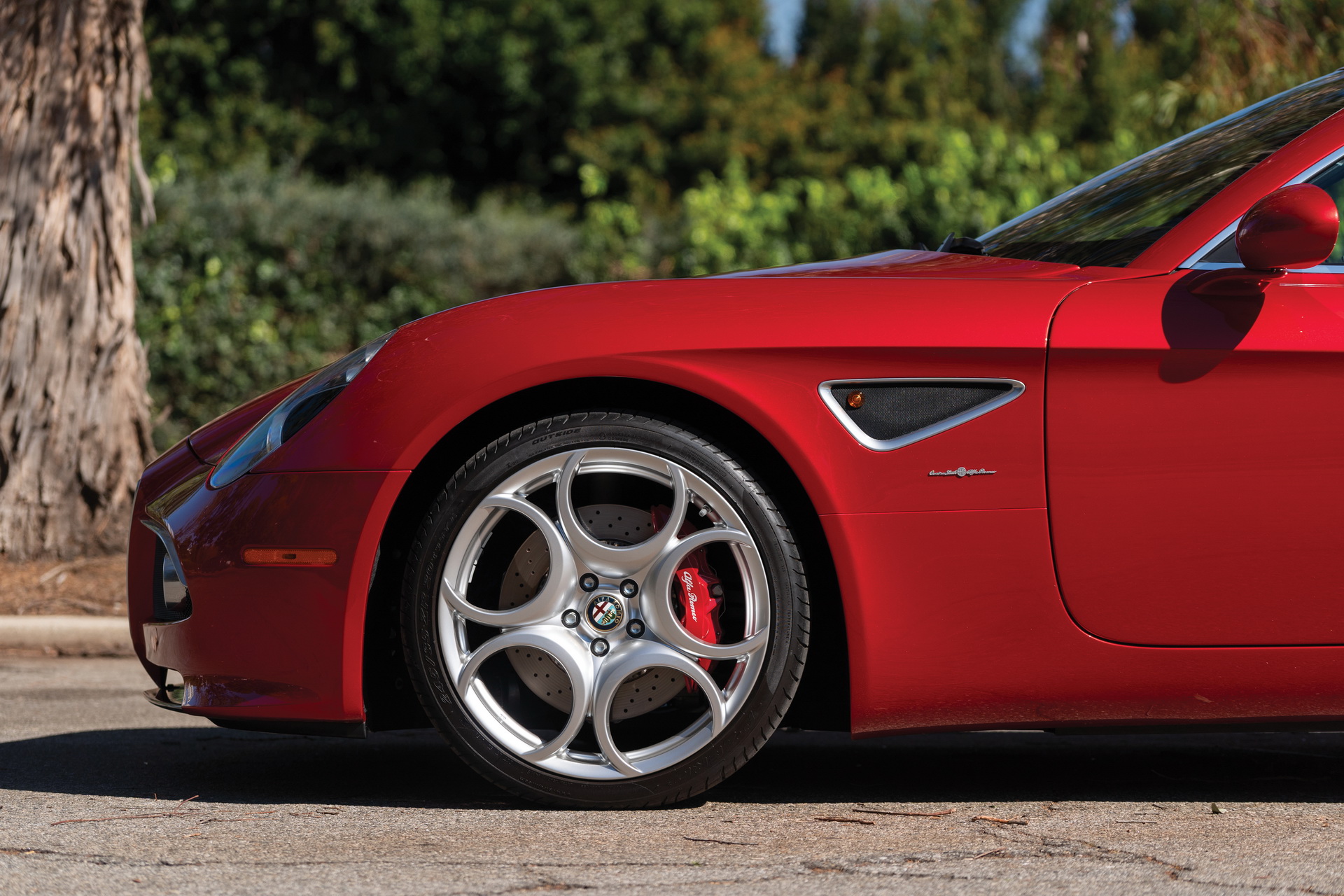 The $200-$300k Question: Alfa Romeo 8C Competizione Or McLaren 675LT Spider?