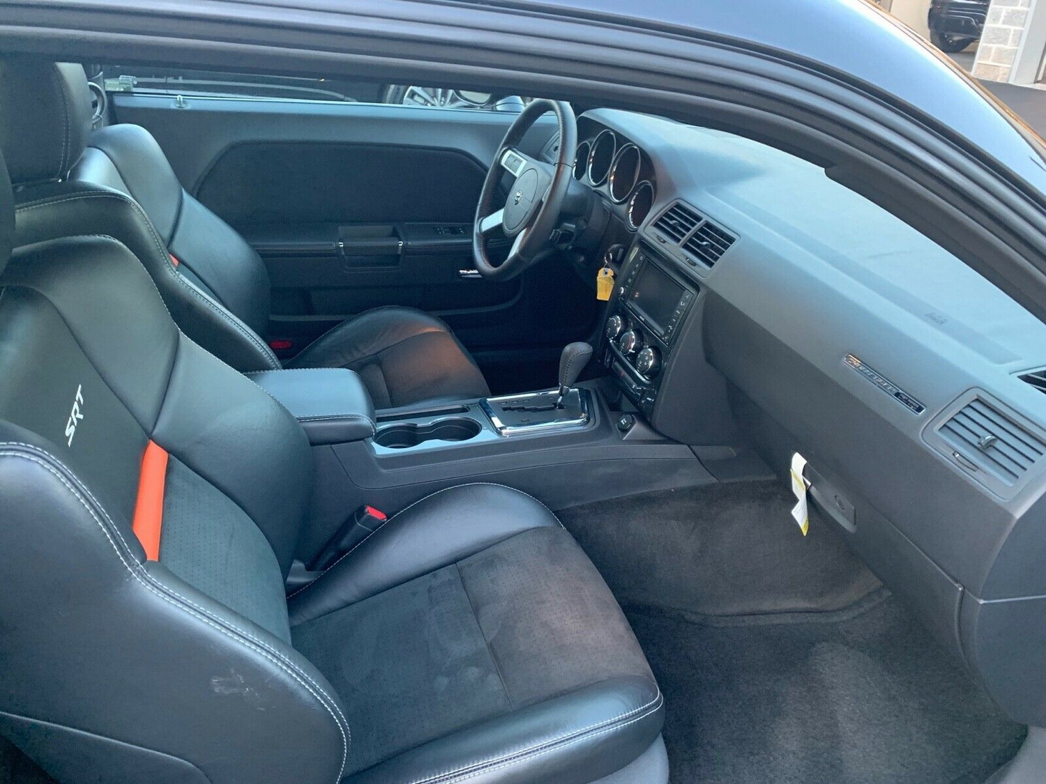 Someone Paid Over $40k In 2008 For This Challenger SRT8 Only To Sell It To You Brand New For $27k After 12 Years