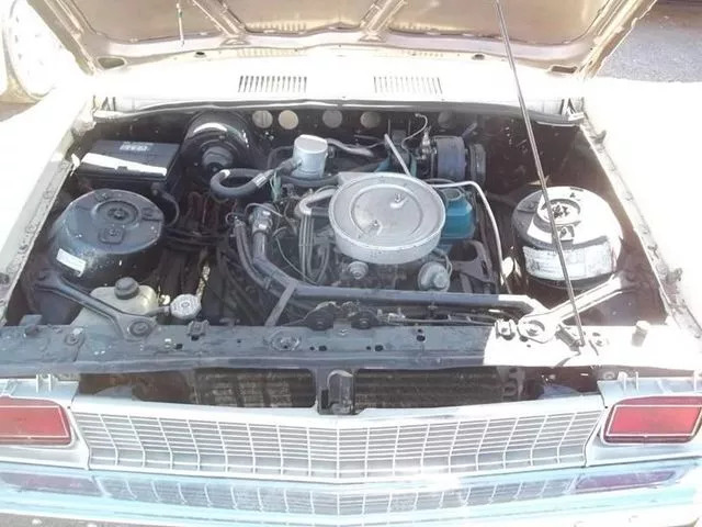 Try Wrapping Your Mind Around This Rear-Engine, Three-Wheel Chevy