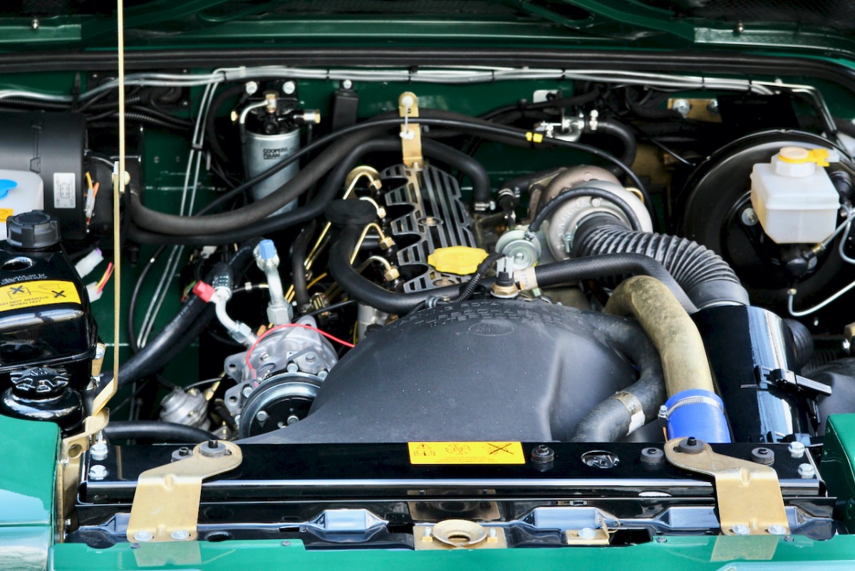 Restomod 1993 Land Rover Defender Wants To Be One With The Woods