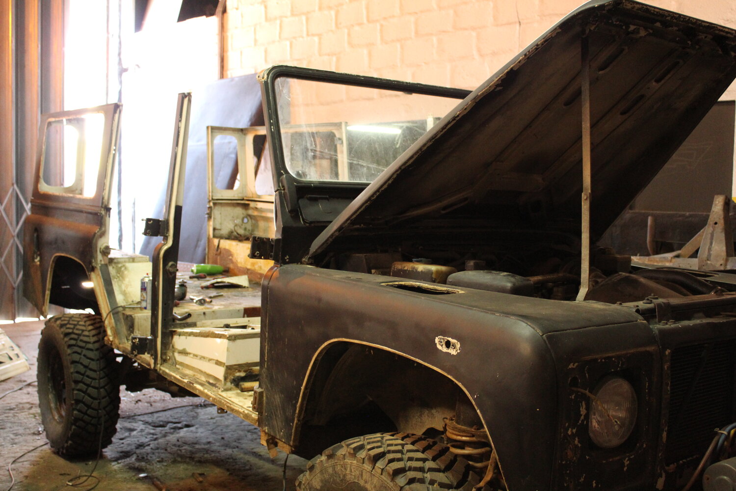 Restomod 1993 Land Rover Defender Wants To Be One With The Woods