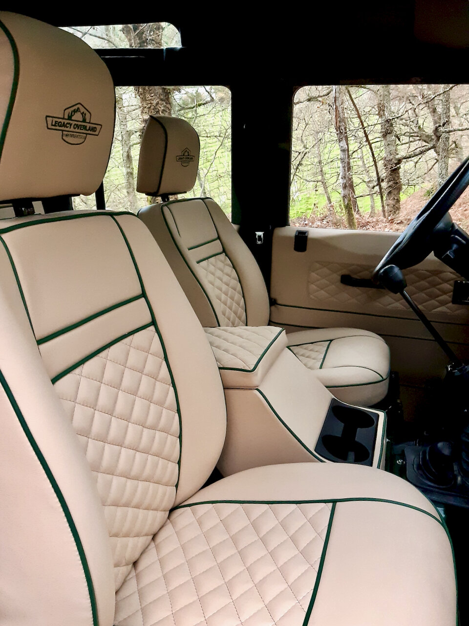 Restomod 1993 Land Rover Defender Wants To Be One With The Woods