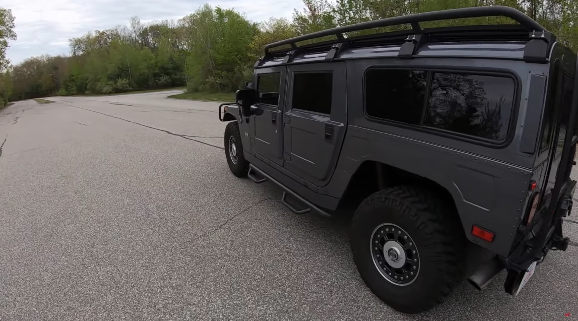 Hop In The Driver’s Seat Of A 2003 Hummer H1 And Feel Like King Of The Road