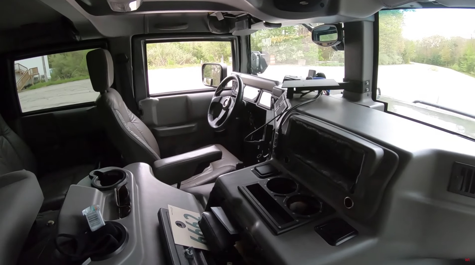 Hop In The Driver’s Seat Of A 2003 Hummer H1 And Feel Like King Of The Road