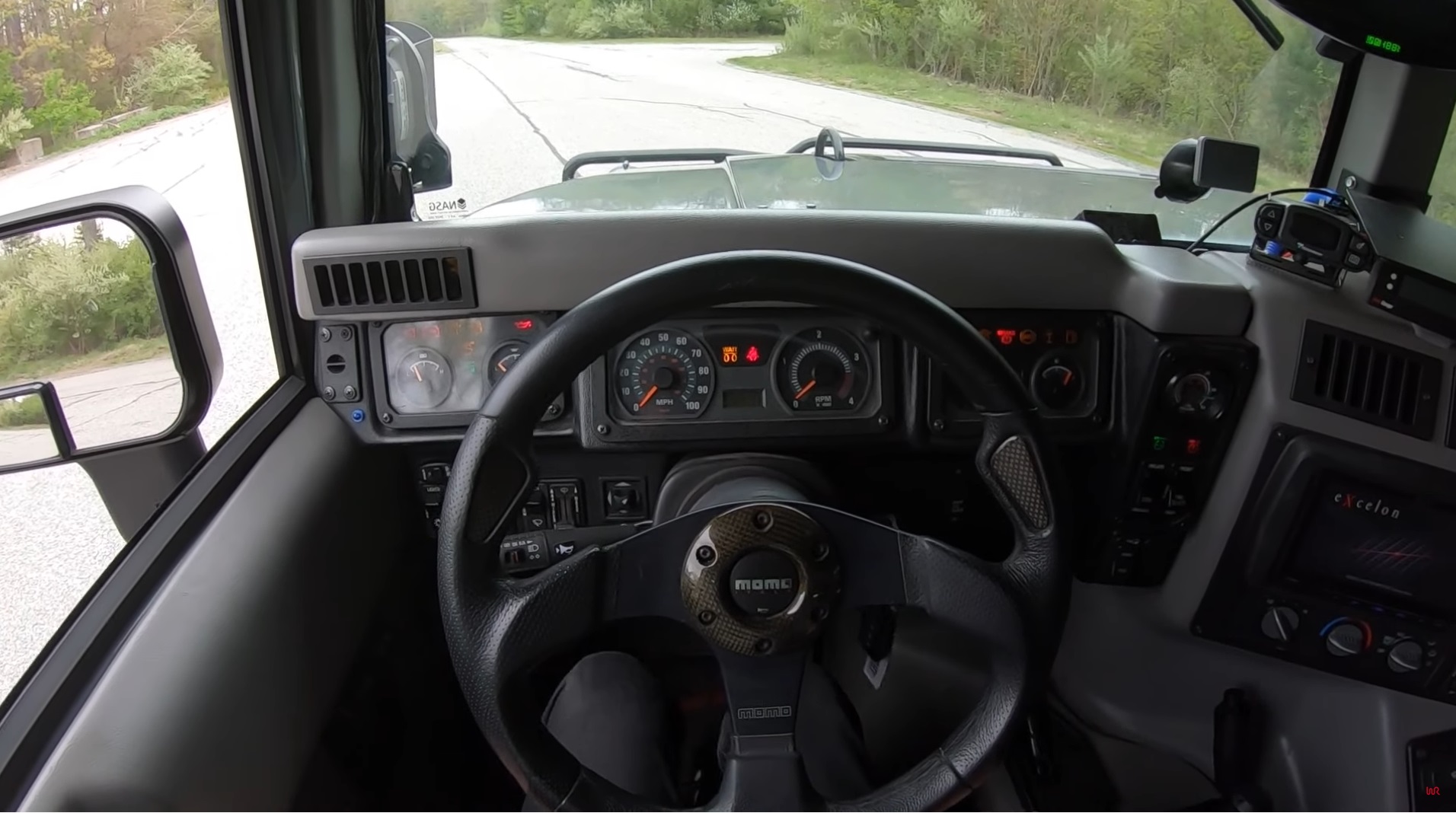 Hop In The Driver’s Seat Of A 2003 Hummer H1 And Feel Like King Of The Road