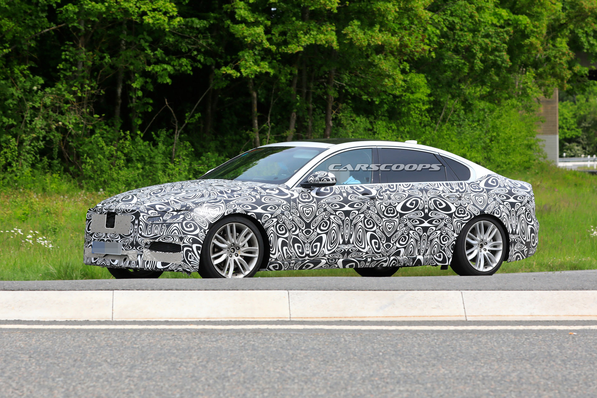 2021 Jaguar XF L Makes Spy Debut With Extra Space For Rear Occupants