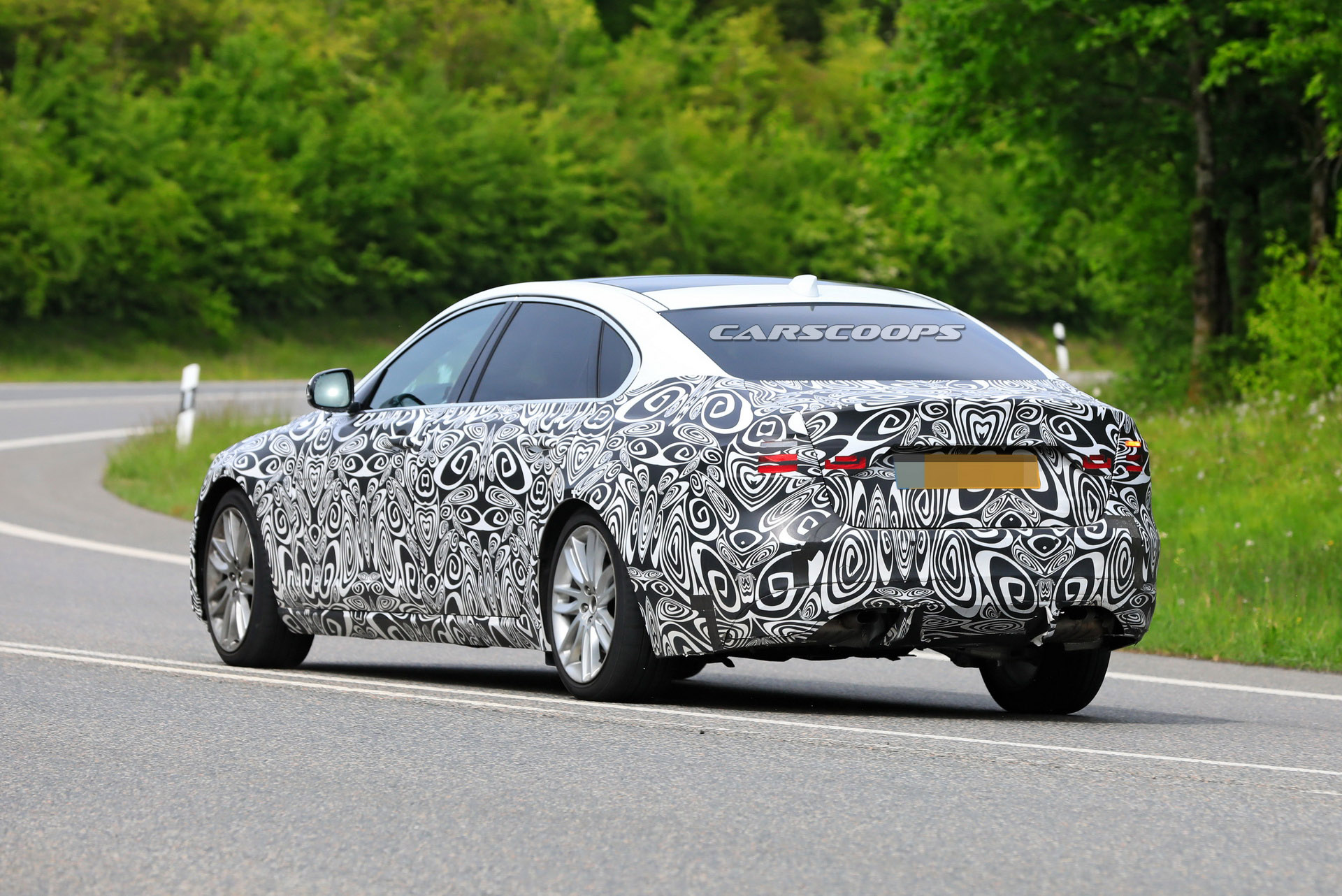 2021 Jaguar XF L Makes Spy Debut With Extra Space For Rear Occupants