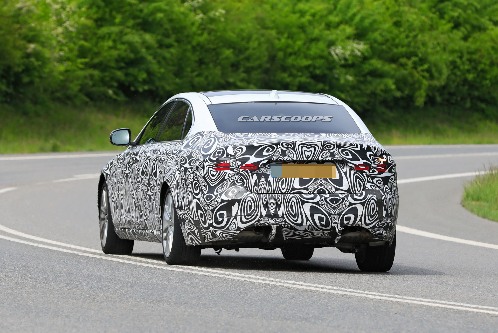 2021 Jaguar XF L Makes Spy Debut With Extra Space For Rear Occupants
