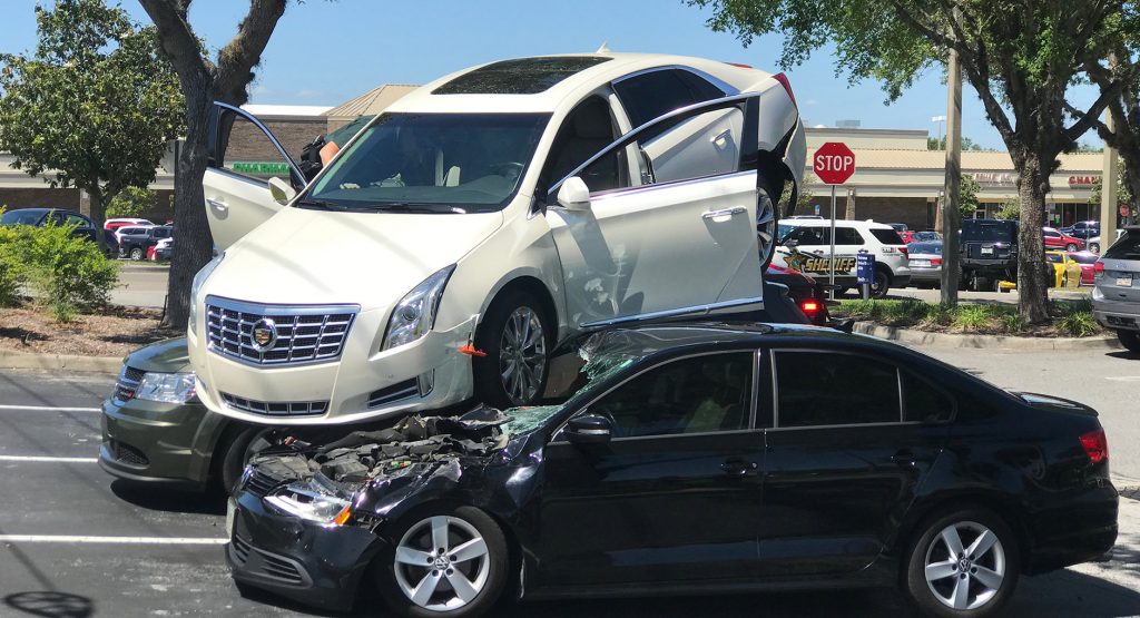  Elderly Florida Driver Somehow Launches Her Cadillac On Top Of A Dodge And A VW
